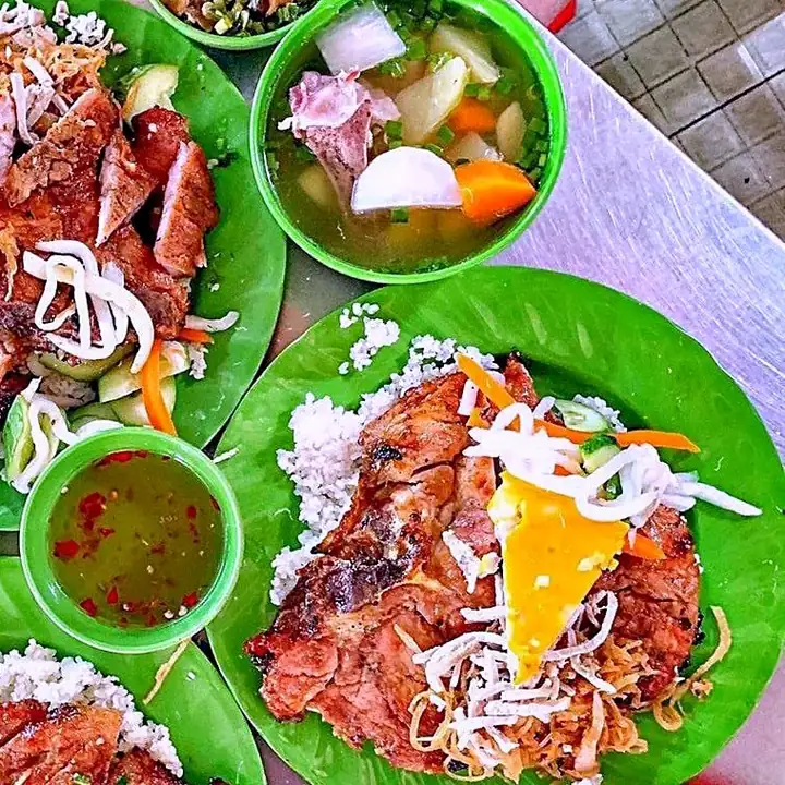 Broken rice with a charcoal-grilled pork chop at Cơm Tấm Ba Ghiền